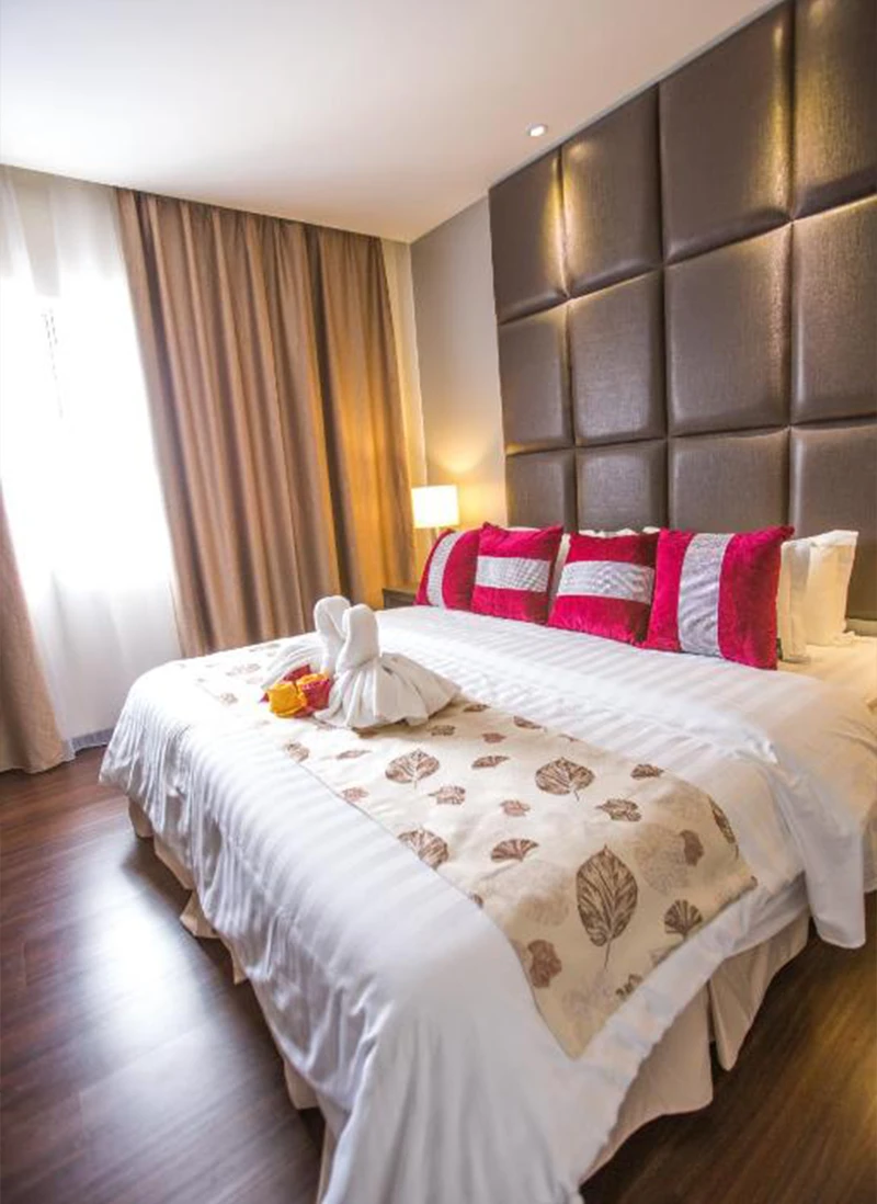 VIP Suite bedroom with swan towel art